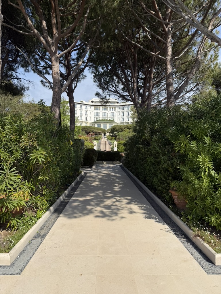 The entrance to Grand-Hôtel du Cap-Ferrat, the approach through the pines