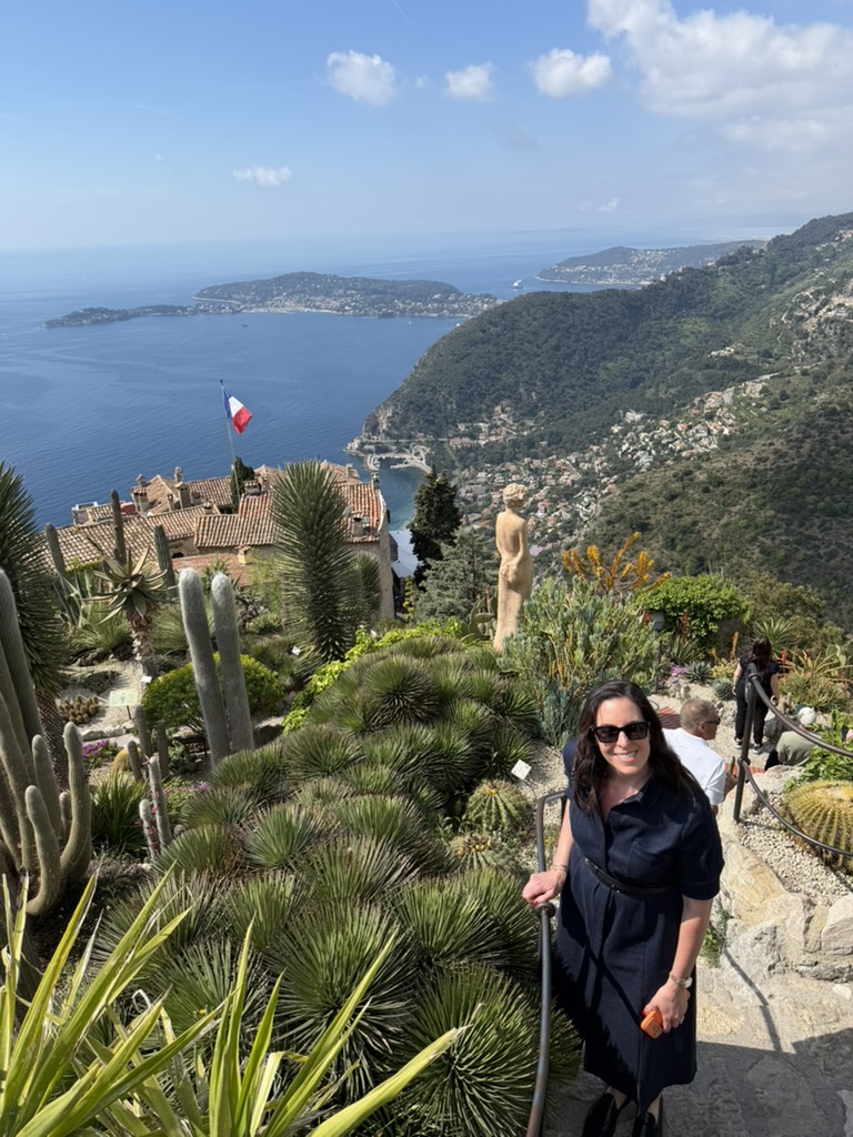 Ashleigh in the Jardin Exotique d'Eze, the coast far below